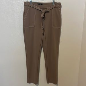 Tan dress pants with a front tie. Size 8.